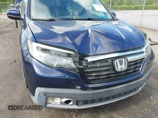 2019 Honda Ridgeline RTL-E with VIN 5FPYK3F76KB010613, listed as a IAAI auction lot 42079810 with 90,492 mi miles and . Bid and sale history available at DreamBid. Image 6.