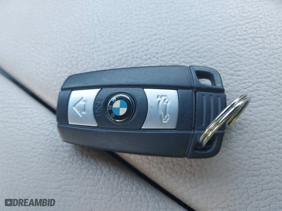 2011 BMW X5 35i with VIN 5UXZV4C51BL740731, listed as a IAAI auction lot 41771257 with 148,638 mi miles. Bid and sale history available at carsss.com. Image 11.