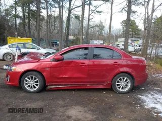 2016 Mitsubishi Lancer SE with VIN JA32V2FW7GU004159, listed as a IAAI auction lot 41401386 with 100,536 mi miles. Bid and sale history available at carsss.com. Image 13.