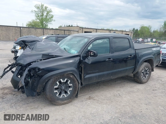 2023 Toyota Tacoma SR with VIN 3TMCZ5AN2PM598464, listed as a IAAI auction lot 42238032 with 35,597 mi miles and . Bid and sale history available at DreamBid. Image 17.