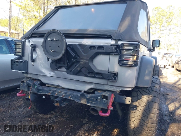 2015 Jeep Wrangler Unlimited Rubicon Hard Rock with VIN 1C4HJWFG1FL777222, listed as a IAAI auction lot 41843893 with 74,718 mi miles and . Bid and sale history available at DreamBid. Image 6.