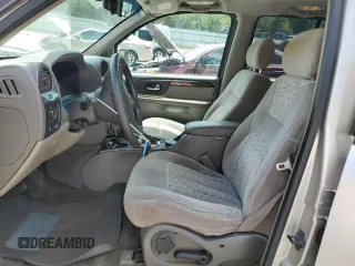 2004 GMC Envoy SLE with VIN 1GKDS13S942119615, listed as a Copart auction lot 69653494 with 141,856 mi miles and Salvage Title. Bid and sale history available at carsss.com. Image 7.