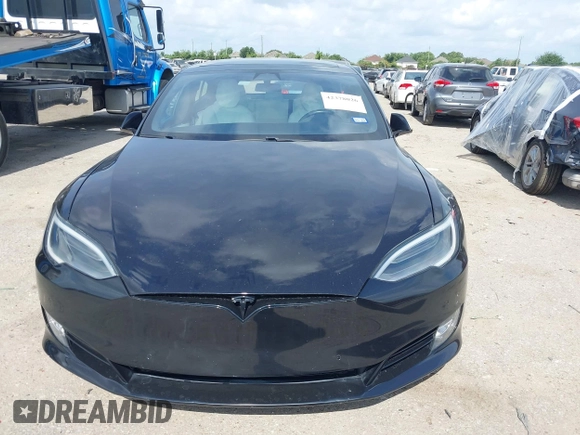 2017 Tesla Model S 100D z VIN 5YJSA1E45HF198921, wystawiony jako IAAI lot #42378026 z przebiegiem 104 967 mil mil oraz . Historia ofert i sprzedaży dostępna na DreamBid. Obrazek 11.