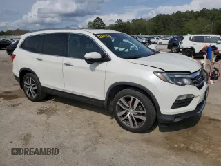 2017 Honda Pilot Touring with VIN 5FNYF5H92HB023469, listed as a Copart auction lot 51663635 with 182,295 mi miles and Salvage Title. Bid and sale history available at carsss.com. Image 4.