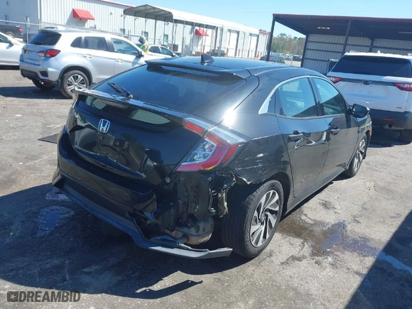 2018 Honda Civic Hatchback LX with VIN SHHFK7H20JU201840, listed as a IAAI auction lot 41775448 with 57,702 mi miles. Bid and sale history available at carsss.com. Image 4.