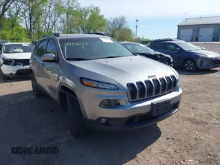 2018 Jeep Cherokee Limited z VIN 1C4PJMDB0JD597899, wystawiony jako IAAI lot #42126159 z przebiegiem 117 359 mil mil oraz . Historia ofert i sprzedaży dostępna na DreamBid. Obrazek 1.