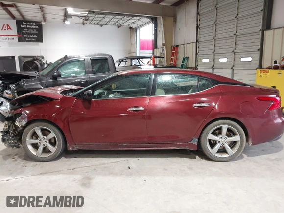 2016 Nissan Maxima SV z VIN 1N4AA6AP8GC431166, wystawiony jako IAAI lot #41973524 z przebiegiem 119 093 mil mil oraz . Historia ofert i sprzedaży dostępna na DreamBid. Obrazek 15.