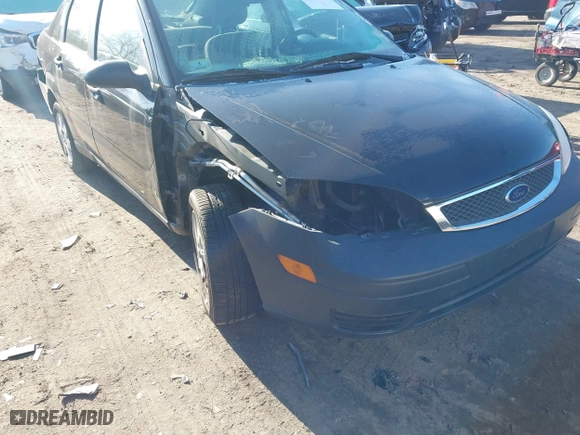 2007 Ford Focus S with VIN 1FAHP34N07W166828, listed as a IAAI auction lot 41992308 with 143,169 mi miles. Bid and sale history available at carsss.com. Image 6.