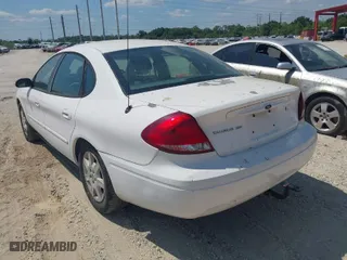 2006 Ford Taurus SE with VIN 1FAHP532X6A257510, listed as a IAAI auction lot 41892422 with 130,633 mi miles. Bid and sale history available at carsss.com. Image 3.