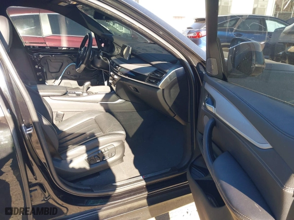 2019 BMW X6 xDrive35i with VIN 5UXKU2C50K0Z62820, listed as a IAAI auction lot 41006008 with 79,104 mi miles. Bid and sale history available at carsss.com. Image 5.