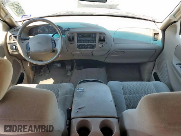 2002 Ford F-150 XL with VIN 1FTRX17202NA40522, listed as a Copart auction lot 58208915 with 100,297 mi miles and Salvage title. Bid and sale history available at DreamBid. Image 8.
