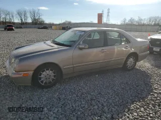 2002 Mercedes-Benz E-Class with VIN WDBJF82J12X062460, listed as a Copart auction lot 79264964 with 113,725 mi miles and Salvage Title. Bid and sale history available at carsss.com. Image 1.