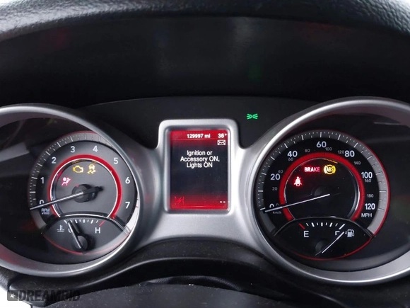 2013 Dodge Journey SXT with VIN 3C4PDCBB1DT565028, listed as a IAAI auction lot 41483127 with 129,997 mi miles. Bid and sale history available at carsss.com. Image 7.