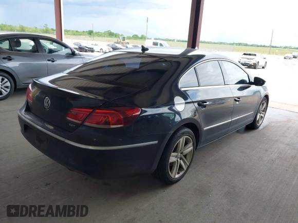 2013 Volkswagen CC Sport with VIN WVWBP7AN1DE506856, listed as a IAAI auction lot 42111392 with 172,706 mi miles. Bid and sale history available at carsss.com. Image 4.