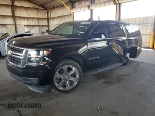 2019 Chevrolet Suburban LT with VIN 1GNSKHKC7KR367184, listed as a Copart auction lot 61683255 with 76,187 mi miles and Salvage title. Bid and sale history available at DreamBid. Image 1.