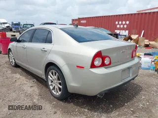 2012 Chevrolet Malibu LTZ with VIN 1G1ZG5E75CF273189, listed as a IAAI auction lot 42065802 with 153,869 mi miles and . Bid and sale history available at DreamBid. Image 3.