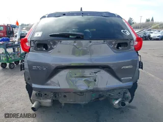 2017 Honda CR-V Touring with VIN 2HKRW2H95HH646184, listed as a IAAI auction lot 41906341 with 58,529 mi miles. Bid and sale history available at carsss.com. Image 17.