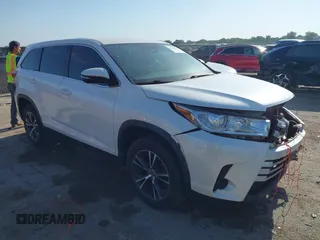 2019 Toyota Highlander LE with VIN 5TDZARFH4KS057307, listed as a IAAI auction lot 42238136 with 74,954 mi miles and . Bid and sale history available at DreamBid. Image 1.