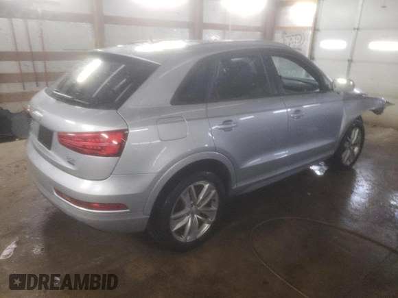 2017 Audi Q3 Premium z VIN WA1ECCFS2HR003491, wystawiony jako Copart lot #89381305 z przebiegiem 82 748 mil mil oraz Szkoda całkowita • Salvage title. Historia ofert i sprzedaży dostępna na DreamBid. Obrazek 3.
