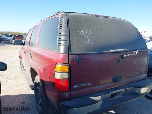 2004 Chevrolet Tahoe LT with VIN 1GNEC13ZX4R166600, listed as a IAAI auction lot 41728301 with 245,044 mi miles. Bid and sale history available at carsss.com. Image 3.