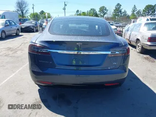 2017 Tesla Model S 100D with VIN 5YJSA1E20HF198503, listed as a IAAI auction lot 41843782 with 77,281 mi miles and . Bid and sale history available at DreamBid. Image 17.