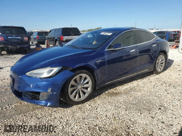 2016 Tesla Model S 70 with VIN 5YJSA1E11GF142964, listed as a Copart auction lot 48319945 with 99,999 mi miles and Clean title. Bid and sale history available at DreamBid. Image 1.