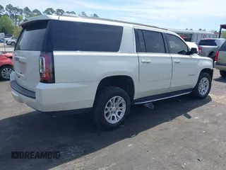2015 GMC Yukon XL SLT with VIN 1GKS1HKC0FR154518, listed as a IAAI auction lot 41905683 with 162,482 mi miles. Bid and sale history available at carsss.com. Image 4.
