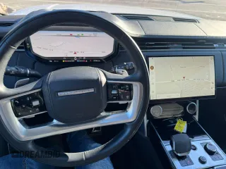 2023 Land Rover Range Rover SE z VIN SALKPBFU8PA009035, wystawiony jako Copart lot #46797635 z przebiegiem 37 025 mil mil oraz Czysty tytuł • Clean title. Historia ofert i sprzedaży dostępna na DreamBid. Obrazek 7.