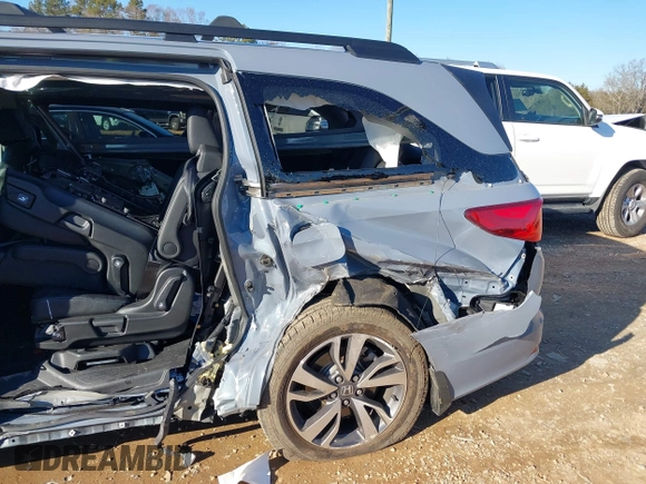 2023 Honda Odyssey Touring with VIN 5FNRL6H84PB005208, listed as a IAAI auction lot 41374452 with 60,288 mi miles and . Bid and sale history available at DreamBid. Image 18.