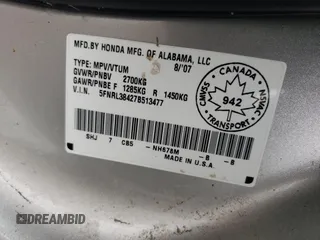 2007 Honda Odyssey EX with VIN 5FNRL38427B513477, listed as a Copart auction lot 62457695 with 216,977 mi miles and Salvage title. Bid and sale history available at DreamBid. Image 14.