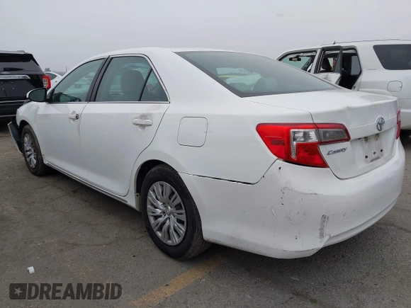 2014 Toyota Camry L with VIN 4T4BF1FK1ER416128, listed as a IAAI auction lot 42030370 with 79,475 mi miles and . Bid and sale history available at DreamBid. Image 3.