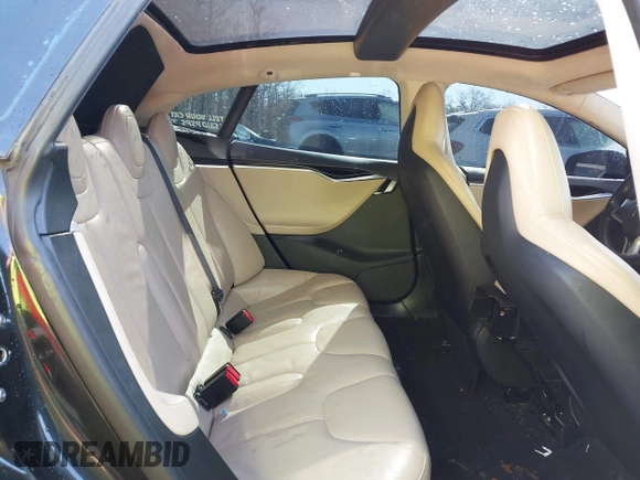 2014 Tesla Model S 60 with VIN 5YJSA1H1XEFP34226, listed as a IAAI auction lot 41806604 with 216,021 mi miles and . Bid and sale history available at DreamBid. Image 8.