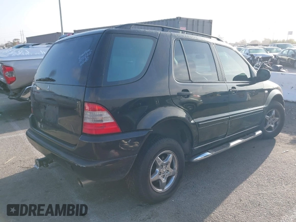 2000 Mercedes-Benz M 320/430/500 with VIN 4JGAB54E3YA164426, listed as a IAAI auction lot 42267653 with 183,306 mi miles and . Bid and sale history available at DreamBid. Image 4.