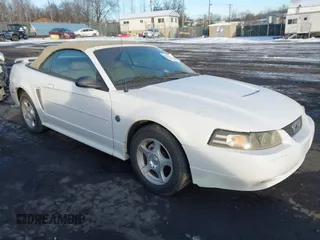 2004 Ford Mustang Deluxe with VIN 1FAFP446X4F214949, listed as a IAAI auction lot 41386560 with 172,410 mi miles. Bid and sale history available at carsss.com. Image 1.