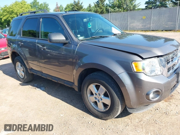 2012 Ford Escape XLT z VIN 1FMCU9DG7CKB28270, wystawiony jako IAAI lot #42607520 z przebiegiem 129 758 mil mil oraz . Historia ofert i sprzedaży dostępna na DreamBid. Obrazek 1.