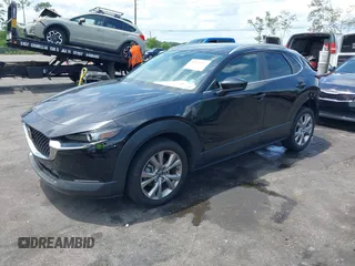 2023 Mazda CX-30 S Carbon Edition с VIN 3MVDMBCM7PM549197, выставлен на аукционе IAAI как лот 42224977 с пробегом 22 201 миль миль и . История ставок и продаж доступна на DreamBid. Изображение 2.