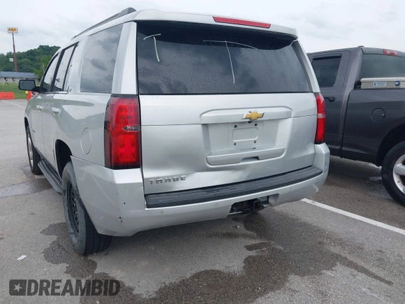 2015 Chevrolet Tahoe LT with VIN 1GNSKBKC3FR224753, listed as a IAAI auction lot 42284497 with 198,943 mi miles and . Bid and sale history available at DreamBid. Image 6.