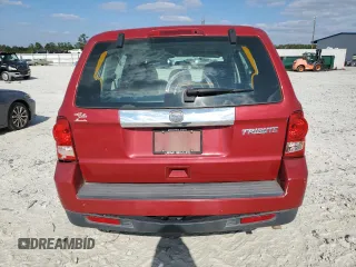 2011 Mazda Tribute Touring with VIN 4F2CY0C7XBKM00671, listed as a Copart auction lot 75431144 with 140,748 mi miles and Clean Title. Bid and sale history available at carsss.com. Image 6.