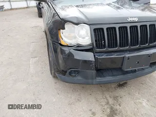 2009 Jeep Grand Cherokee Laredo with VIN 1J8GR48K19C546439, listed as a IAAI auction lot 42097256 with 146,930 mi miles. Bid and sale history available at carsss.com. Image 6.