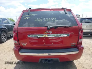 2009 Jeep Grand Cherokee with VIN 1J8HR68T79C539925, listed as a IAAI auction lot 42157077 with 140,443 mi miles and . Bid and sale history available at DreamBid. Image 15.