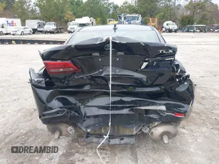 2017 Acura TLX with VIN 19UUB1F3XHA006883, listed as a IAAI auction lot 41378116 with 113,469 mi miles. Bid and sale history available at carsss.com. Image 16.