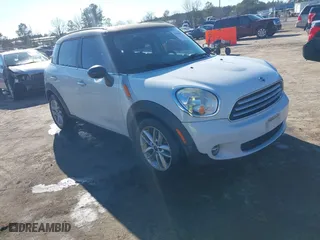 2013 MINI Cooper Countryman with VIN WMWZB3C55DWR36061, listed as a IAAI auction lot 41666672 with 155,222 mi miles. Bid and sale history available at carsss.com. Image 1.