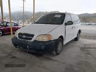 2003 Kia Sedona LX with VIN KNDUP131536402900, listed as a IAAI auction lot 41500260 with 143,825 mi miles and . Bid and sale history available at DreamBid. Image 2.