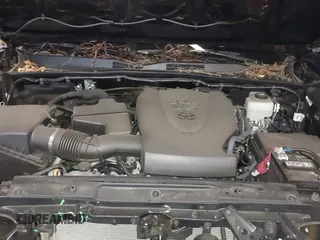 2023 Toyota Tacoma SR z VIN 3TMCZ5AN1PM583518, wystawiony jako IAAI lot #41842903 z przebiegiem 24 204 mil mil oraz . Historia ofert i sprzedaży dostępna na DreamBid. Obrazek 10.