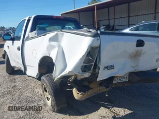 2003 Ford F-150 XL with VIN 2FTRF17W03CA59388, listed as a IAAI auction lot 41673651 with 221,668 mi miles. Bid and sale history available at carsss.com. Image 16.