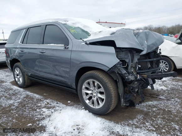 2022 Chevrolet Tahoe Premier with VIN 1GNSKSKD6NR145066, listed as a IAAI auction lot 41338354 with 82,694 mi miles. Bid and sale history available at carsss.com. Image 1.