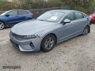 2022 Kia K5 LXS with VIN 5XXG14J2XNG085986, listed as a IAAI auction lot 40832049 with 55,403 mi miles. Bid and sale history available at carsss.com. Image 2.