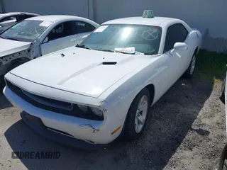 2013 Dodge Challenger SXT z VIN 2C3CDYAG8DH569468, wystawiony jako IAAI lot #41792206 z przebiegiem 161 439 mil mil oraz . Historia ofert i sprzedaży dostępna na DreamBid. Obrazek 2.