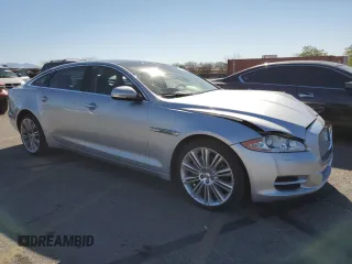 2015 Jaguar XJ with VIN SAJWA2GZ4F8V90853, listed as a Copart auction lot 72631114 with 59,237 mi miles and Salvage Title. Bid and sale history available at carsss.com. Image 4.