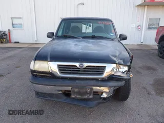 1999 Mazda B-Series 2WD Truck SE with VIN 4F4YR16V8XTM09770, listed as a IAAI auction lot 41416620 with 245,604 mi miles. Bid and sale history available at carsss.com. Image 13.